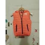 Doudoune sans manches orange 6 ans north face.