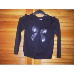 Gilet pressionn� de marque sergent major de couleur noir , fantaisies :noeud en paillette argent� sur ...