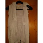 Gilet sans manche avec pompons