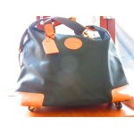 Grand sac de voyage  roulettes de marque lancel