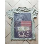Haut - tee shirt tommy hilfiger taille s / m.