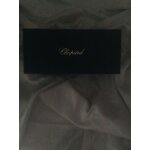 Je vends des lunettes de soleil chopard noir et dor� avec 2 verres suppl�mentaires