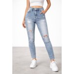 Jean bleu clair leger trou� d'origine taille 36 megusto