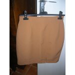 Jupe blanche porte taille  plat 36 polyester 100%.