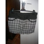 Jupe courte double morgan taille 36, 2 poches avant, 2 poches arrire.
