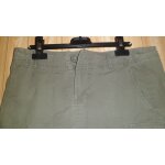 Jupe courte kaki h & m. t. 36. 100 % coton. 2 poches arrire. devant : 2 poches + 2 poches fermant avec ...