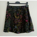 Jupe courte en voile noir fleurs multicolore. trapeze. camaieu. polyester. taille 38