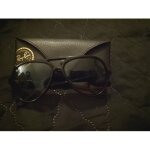 Lunettes ray ban homme noires .
