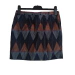 Mini jupe multicolore a losanges. naf naf. taille 36