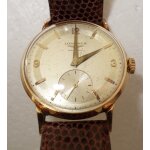 - montre homme longines m�canique en or massif de 1974.