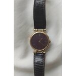 Vends montre michl herbelin, pour femme cadran chiffres romain, plaque or, fond bordeaux, et bracelet ...