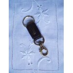 Mousqueton porte cl�s neuf mac douglas cuir noir et m�tal dor� .