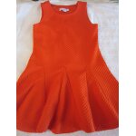 Vends petite robe tissu rouge gaufr� . neuve 8 ans et taille 128 cm
