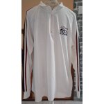 Polo blanc � manches longues avec le col zipp�