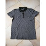 Polo homme gris et noir taille m marque rip curl manches courtes