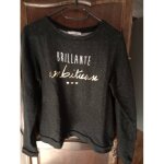 Pull femme noir paillettes �criture dessus