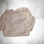 Pull rose fille