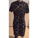 Robe avantageuse noire À motifs géométriques blancs Robe avantageuse noire À motifs géométriques blancs