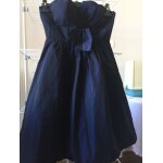 Robe bustier t. m ou 38 en taffetas bleu moiré avec noeud devant longueur genou alain manoukian Robe bustier t. m ou 38 en taffetas bleu moiré avec noeud devant longueur genou alain manoukian