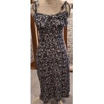 Robe noire mi - longue fendue devant  petites fleurs blanches et rouges