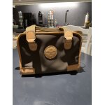 Sac � main ou sac de toilette de voyage bi mati�re cuir et toile deperlante