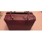 Sac de voyage  le tanneur  bordeaux jamais servi 34cm de longueur 24cm de hauteur sur 19cm de large, ...