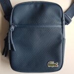 Sacoche zipp�e bleu marine lacoste