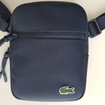 Sacoche zipp�e bleu marine lacoste