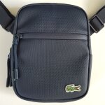 Sacoche zipp�e bleu marine lacoste