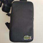 Sacoche zipp�e noire lacoste