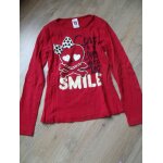 T - shirt c&a rouge tete de mort 10. 11ans T - shirt c&a rouge tete de mort 10. 11ans