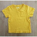 T shirt orange. col v. poche poitrine. orchestra. coton. 4 ans
