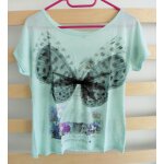 T - shirt vert imprimé fée. ailes en voile noir effet papillon. pimkie. taille 38 T - shirt vert imprimé fée. ailes en voile noir effet papillon. pimkie. taille 38