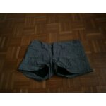 Short a carreaux noirs et blancs taille u. s 27 marque quiksilver
