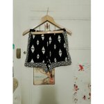 Short noir motifs blancs 32 xxs h&m.