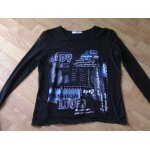 Tee shirt burton noir et bleu mi voile taille 40 tbe Tee shirt burton noir et bleu mi voile taille 40 tbe
