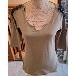 Tee - shirt kaki avec des sequins noirs sur les �paules