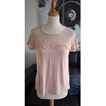 Top blanche porte rose