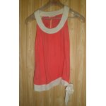 Top camaieu bicolore saumon et blanc, taille 40. sans manches. 100 % viscose