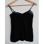 Top noir a dentelle. etam. taille 36 Top noir a dentelle. etam. taille 36