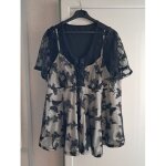 Tunique neuve taille 48 noir motif papillon