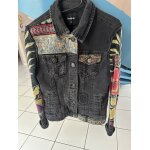 Veste bi mati�re noir desigual taille 38 en parfait �tat