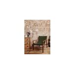 Le fauteuil en tissu bouclette vert