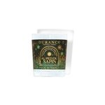 Petite bougie parfume au pied du sapin