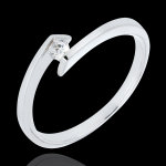 Bague solitaire nid pr�cieux - princesse �toile - or blanc 18 carats -