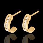Boucles d'oreilles demi lunes or jaune 18 carats paves - 0. 31 carats -