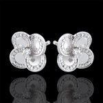 Boucles d'oreilles eclosion - tr�fle blanc - or blanc 9 carats et diam
