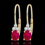 Boucles d'oreilles exquises - rubis et diamants - or jaune 9 carats Boucles d'oreilles exquises - rubis et diamants - or jaune 9 carats