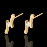 Boucles d'oreilles nid pr�cieux - apostrophe diamants - or jaune 18 car