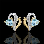 Boucles d'oreilles ouaki - topaze bleue - or blanc et or jaune 9 carats Boucles d'oreilles ouaki - topaze bleue - or blanc et or jaune 9 carats